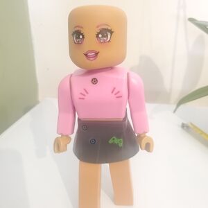 Pink and Black Kids Toy Figure